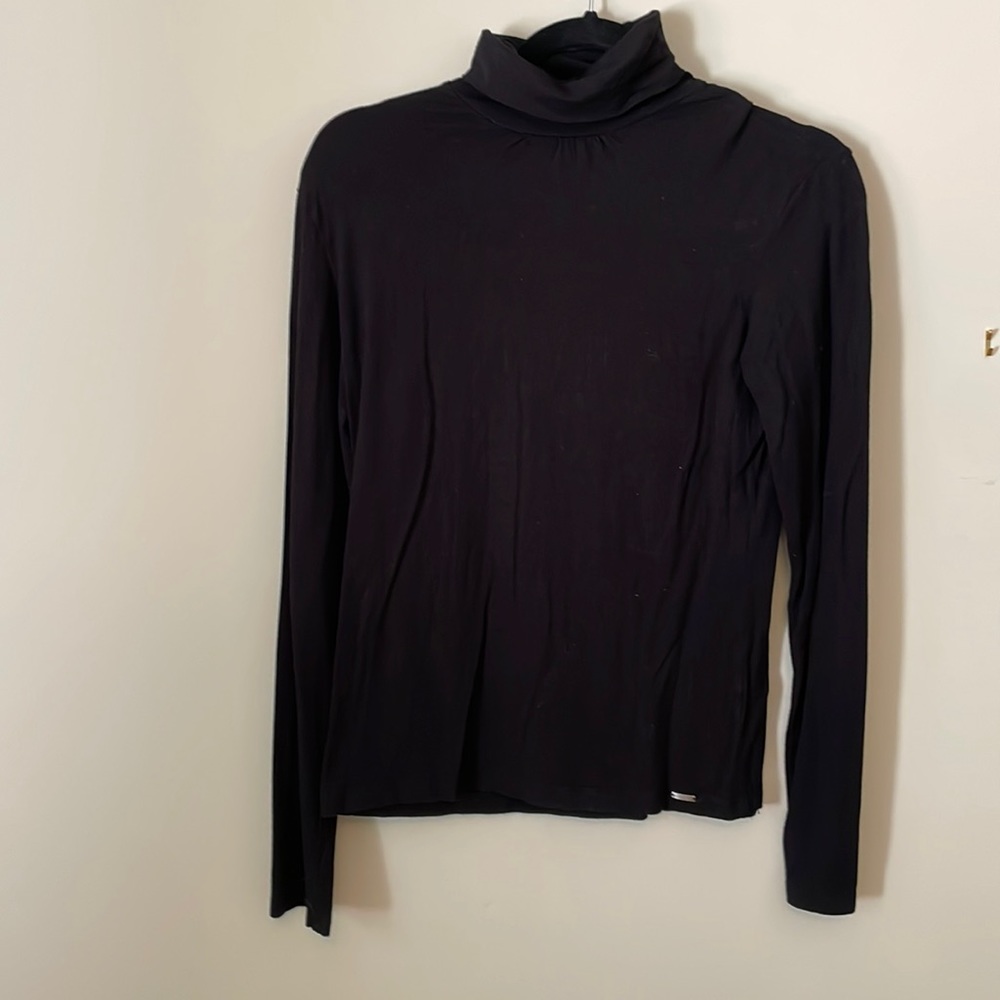 Black turtleneck with ruched collar